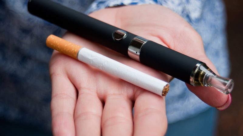 photo of e-cigarettes in someone's hand